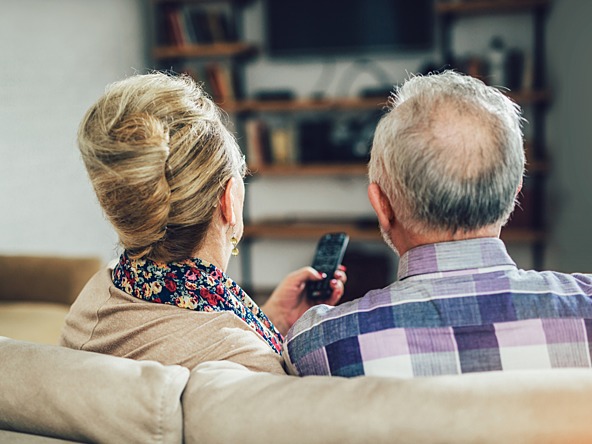 Older couple watching TV